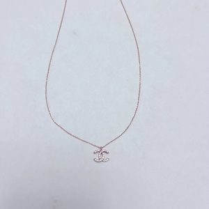 Chanel Rose Gold color. Beautiful, unique buy with confidence. Lovely pendant